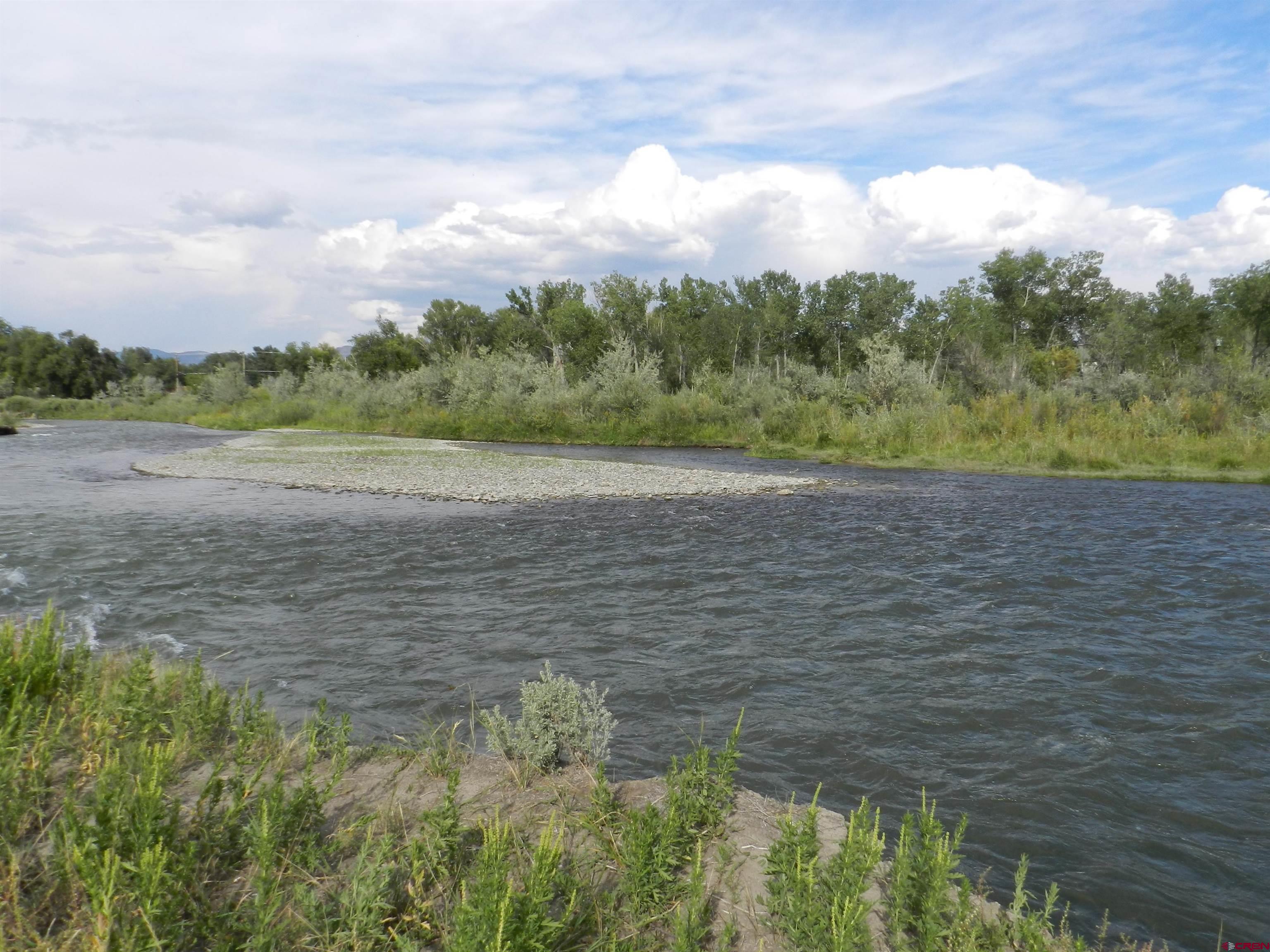 755 Spring Creek Road Montrose, CO 81403 - Photo 18 of 33 a view of an ocean beach