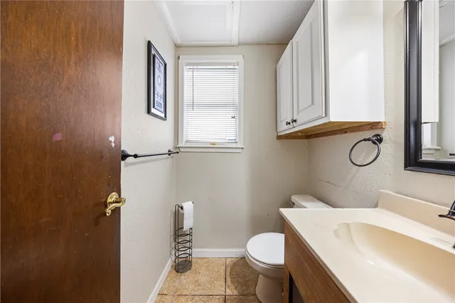 a bathroom with a sink and a toilet