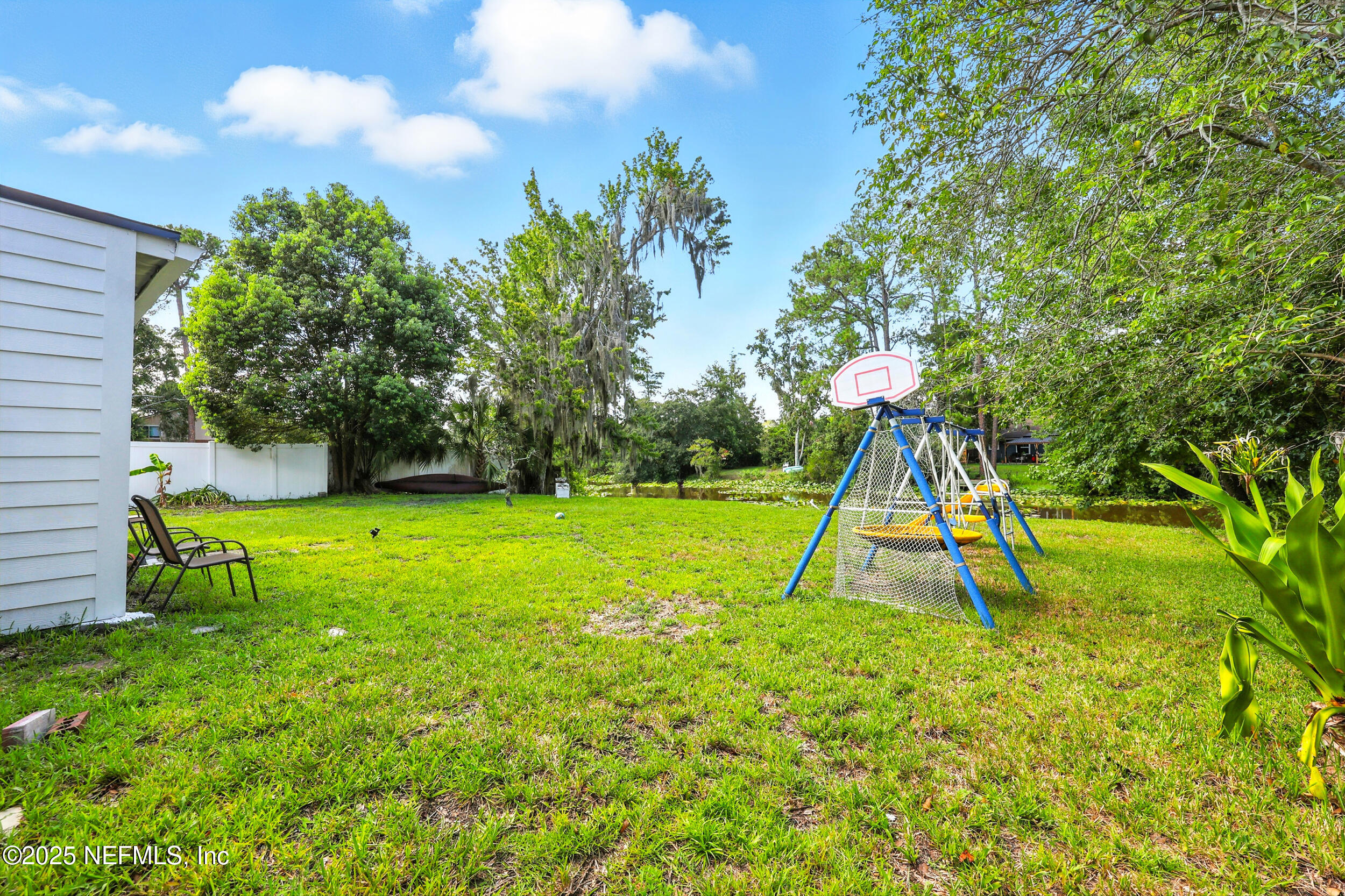 11599 Lake Ride Drive Jacksonville, FL 32223 - Photo 34 of 38 a view of a park with a slide