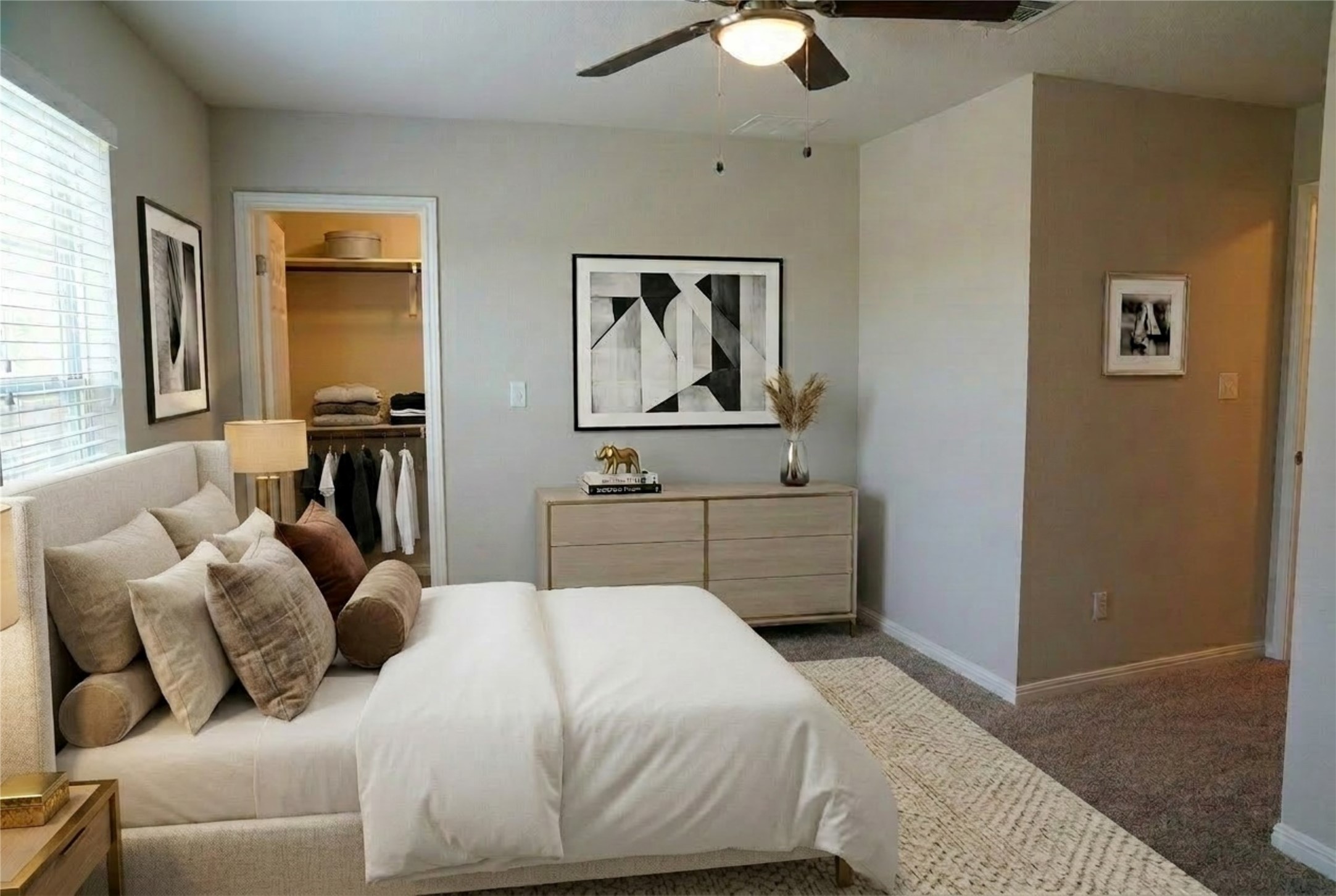 19028 Quebrada Drive Pflugerville, TX 78660 - Photo 20 of 36 a bedroom with a bed and a chandelier