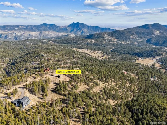 a view of lake and mountain