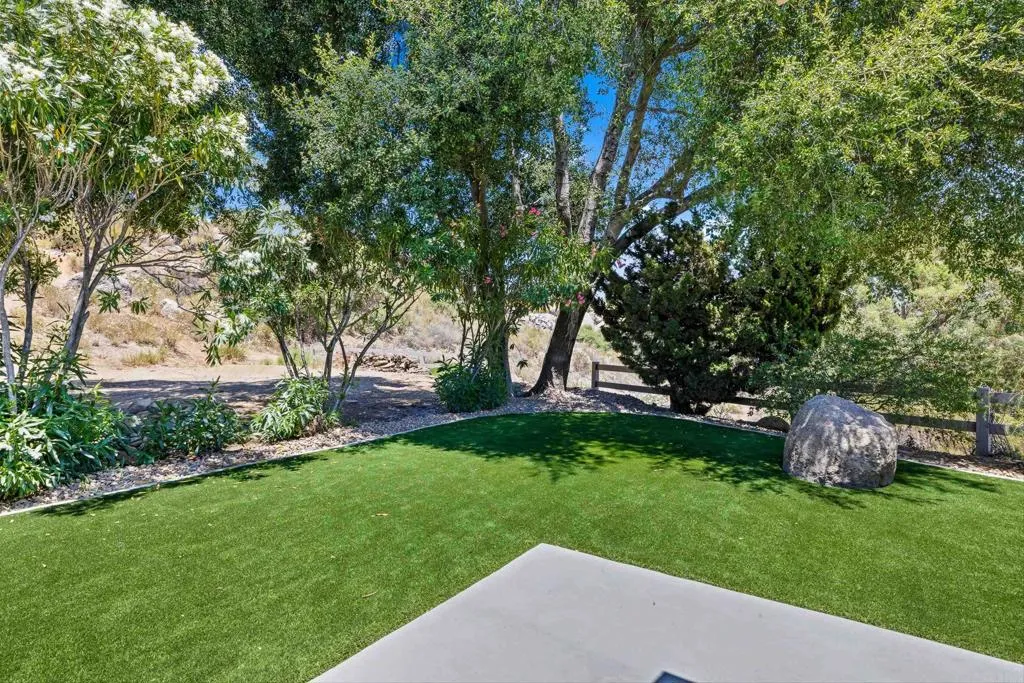 2686 Via Viejas Alpine, CA 91901 - Photo 25 of 40 a view of a backyard with large trees