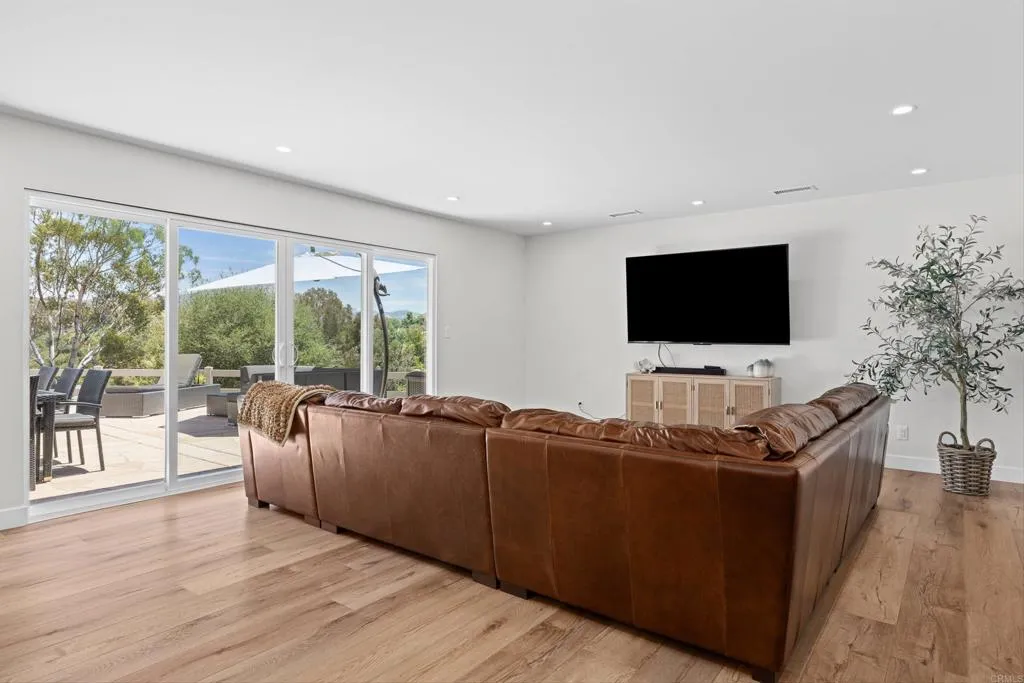 2686 Via Viejas Alpine, CA 91901 - Photo 6 of 40 a living room with furniture and a flat screen tv