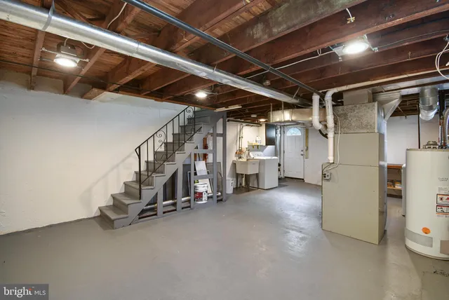 a view of an empty room with water heater