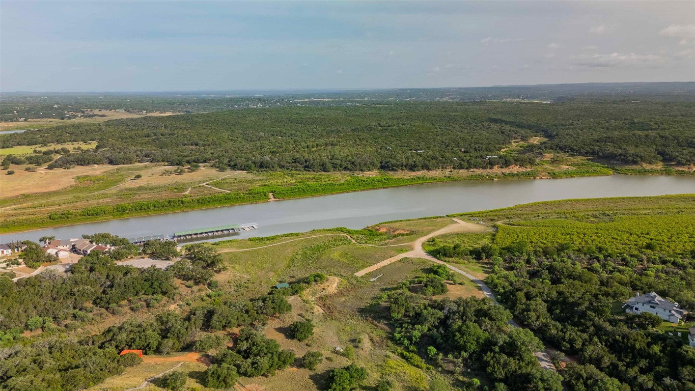 Lot 64 Wesley Ridge Drive Spicewood, TX 78669 - Photo 29 of 32 a view of an ocean and beach