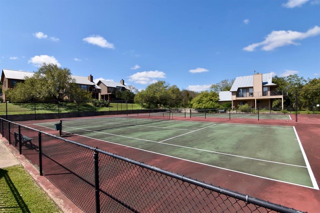 Lot 64 Wesley Ridge Drive Spicewood, TX 78669 - Photo 32 of 32 a view of a tennis court