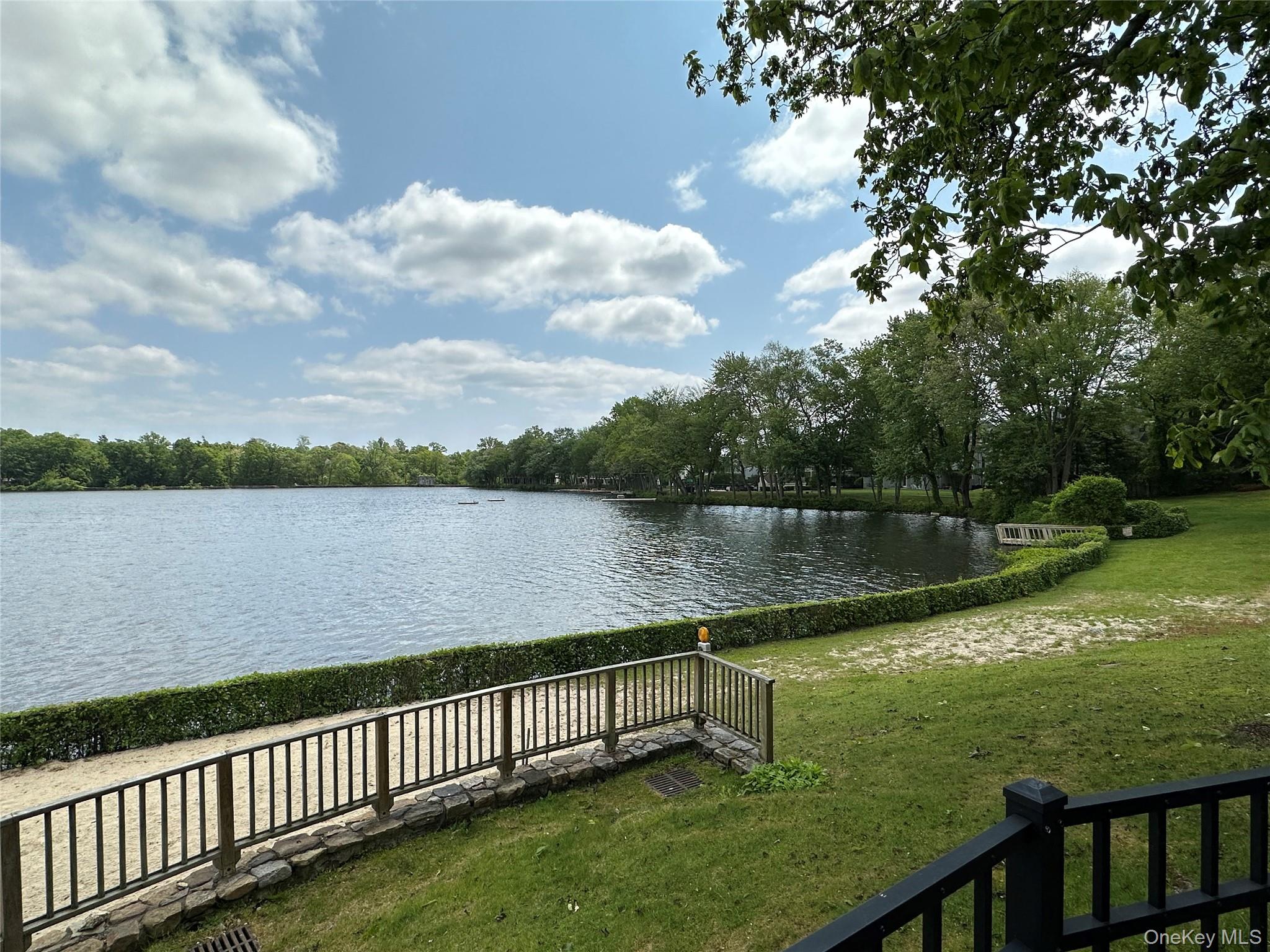 61 Manchester Road, Unit A21 Eastchester, NY 10709 - Photo 19 of 25 a view of lake with green space
