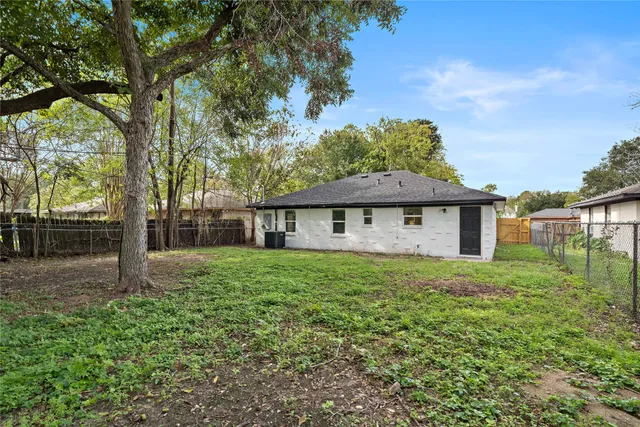 a house view with a garden space