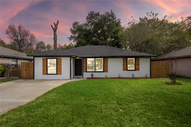a front view of a house with yard