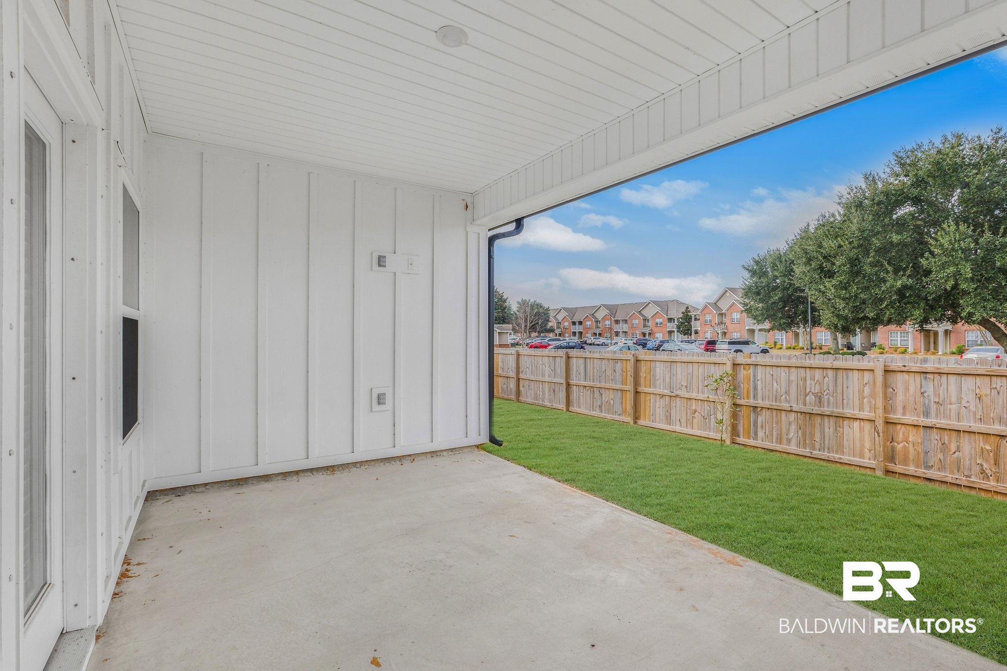 9859 Willet Way Foley, AL 36535 - Photo 4 of 23 Fenced backyard with a patio area and a residential view
