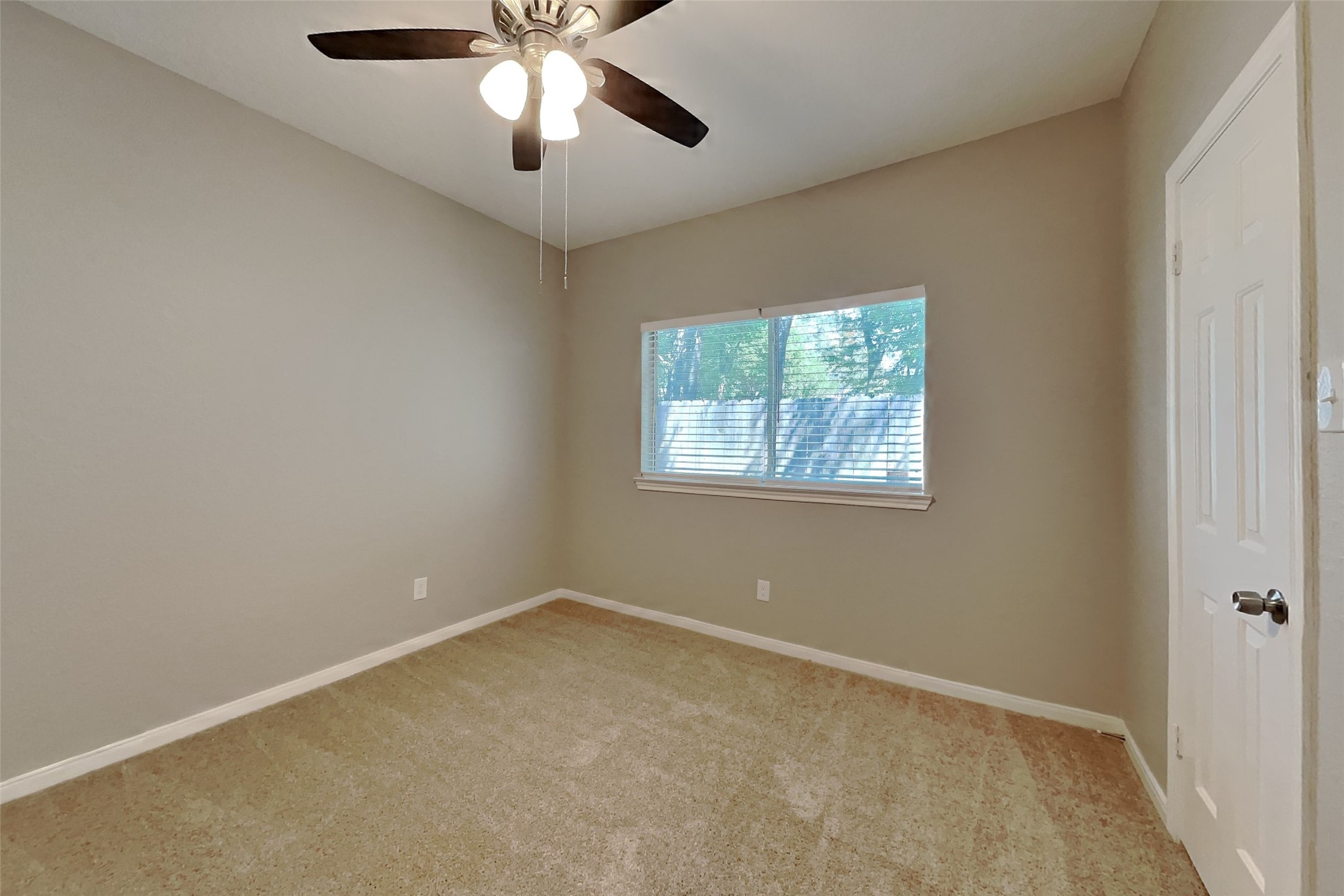 8615 Mile Run Road Humble, TX 77346 - Photo 11 of 19 an empty room with a window