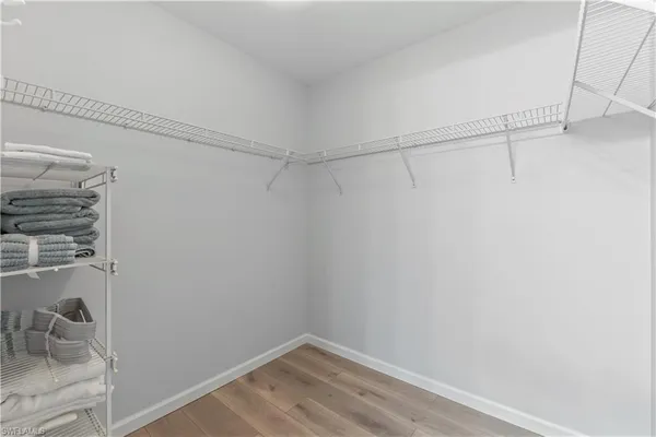 a view of a room with racks on the wall