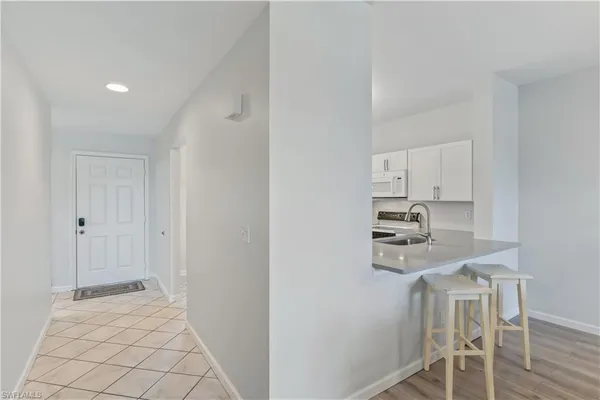 a view of kitchen and sink