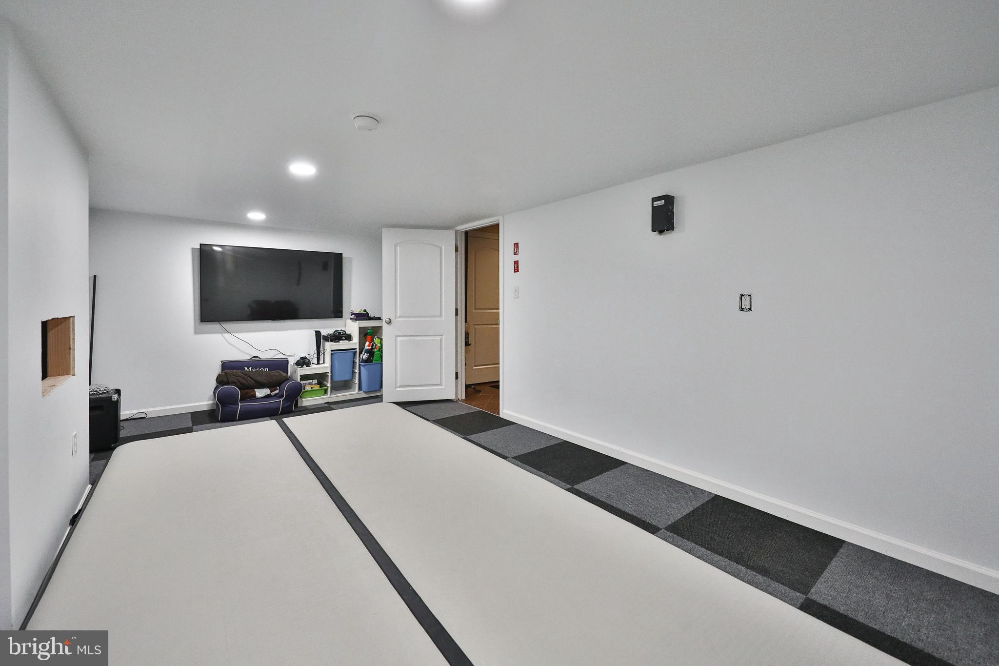 1639 Copper Beech Road Huntingdon Valley, PA 19006 - Photo 46 of 54 Kids lower level playroom