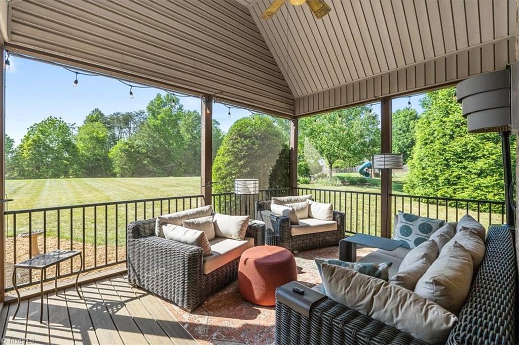 7787 Sutter Road Greensboro, NC 27455 - Photo 43 of 50 Recently finished screened in back patio, just in time for the warm weather!