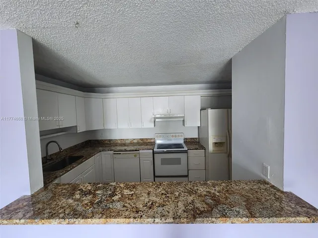 $170,000 | 14830 Naranja Lakes Boulevard, Unit A1A, Homestead, FL 33032