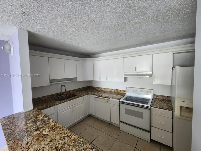 $170,000 | 14830 Naranja Lakes Boulevard, Unit A1A, Homestead, FL 33032