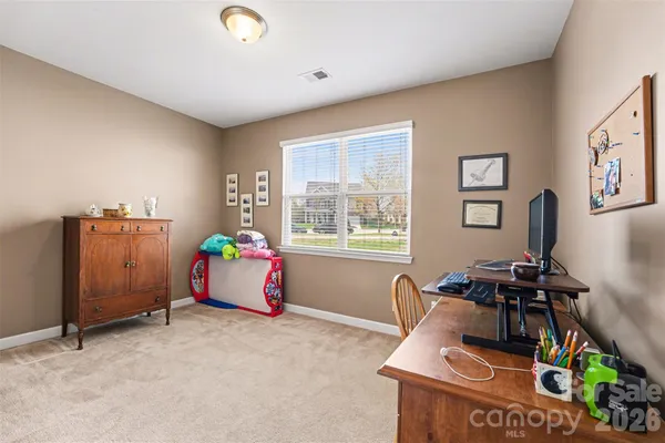 a bathroom with a toilet and a sink