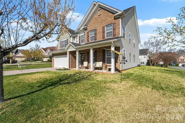 front view of house with a yard