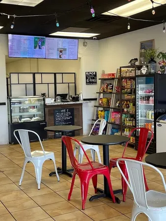 a room with lots of chairs and musical instruments