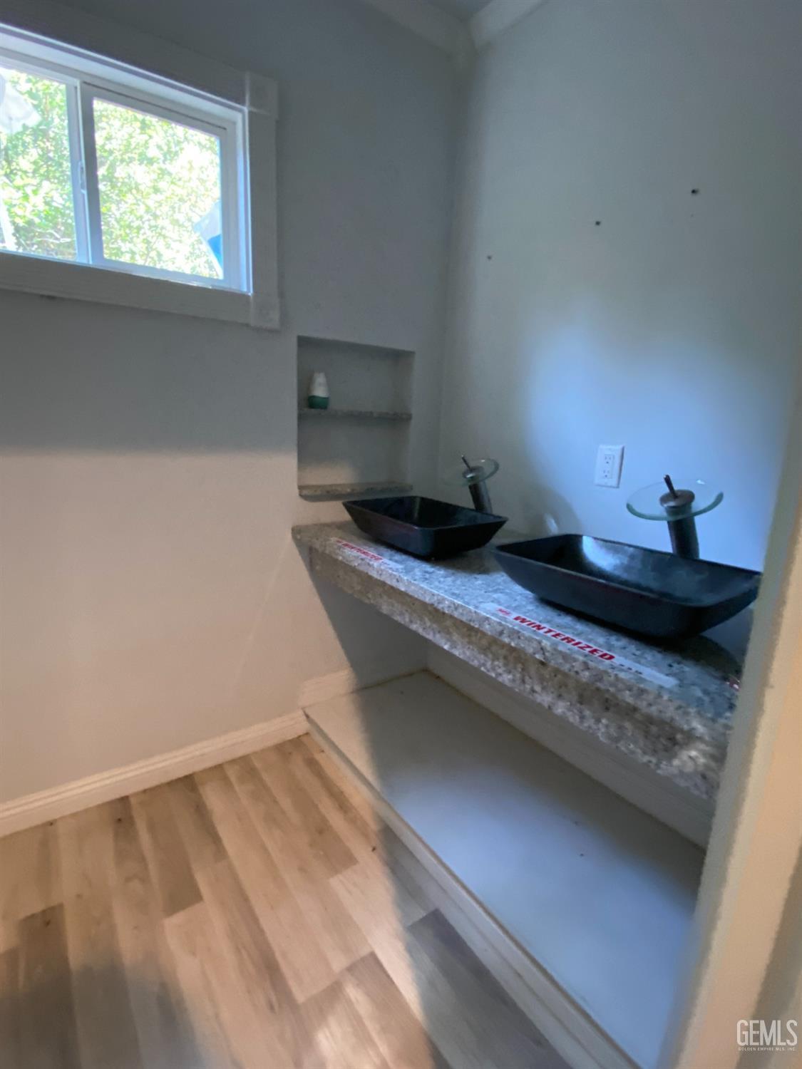 Undisclosed Address Posey, CA 93260 - Photo 11 of 21 a bedroom with a sink and a window