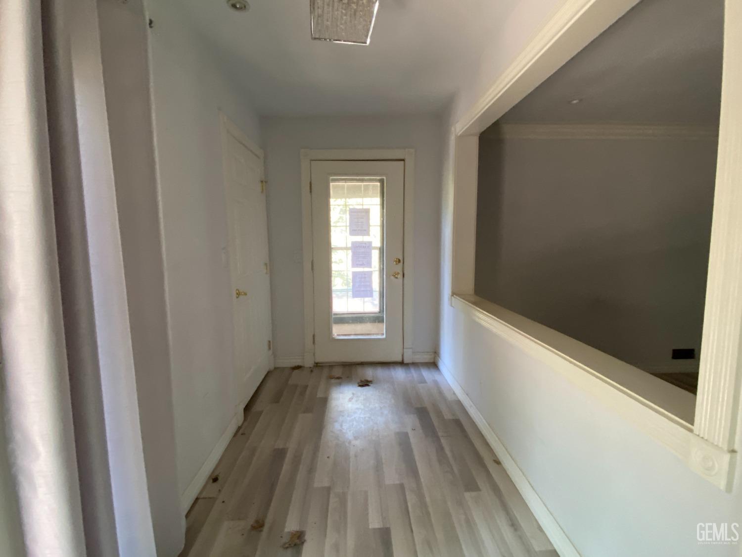 Undisclosed Address Posey, CA 93260 - Photo 13 of 21 a view of hallway with window and wooden floor