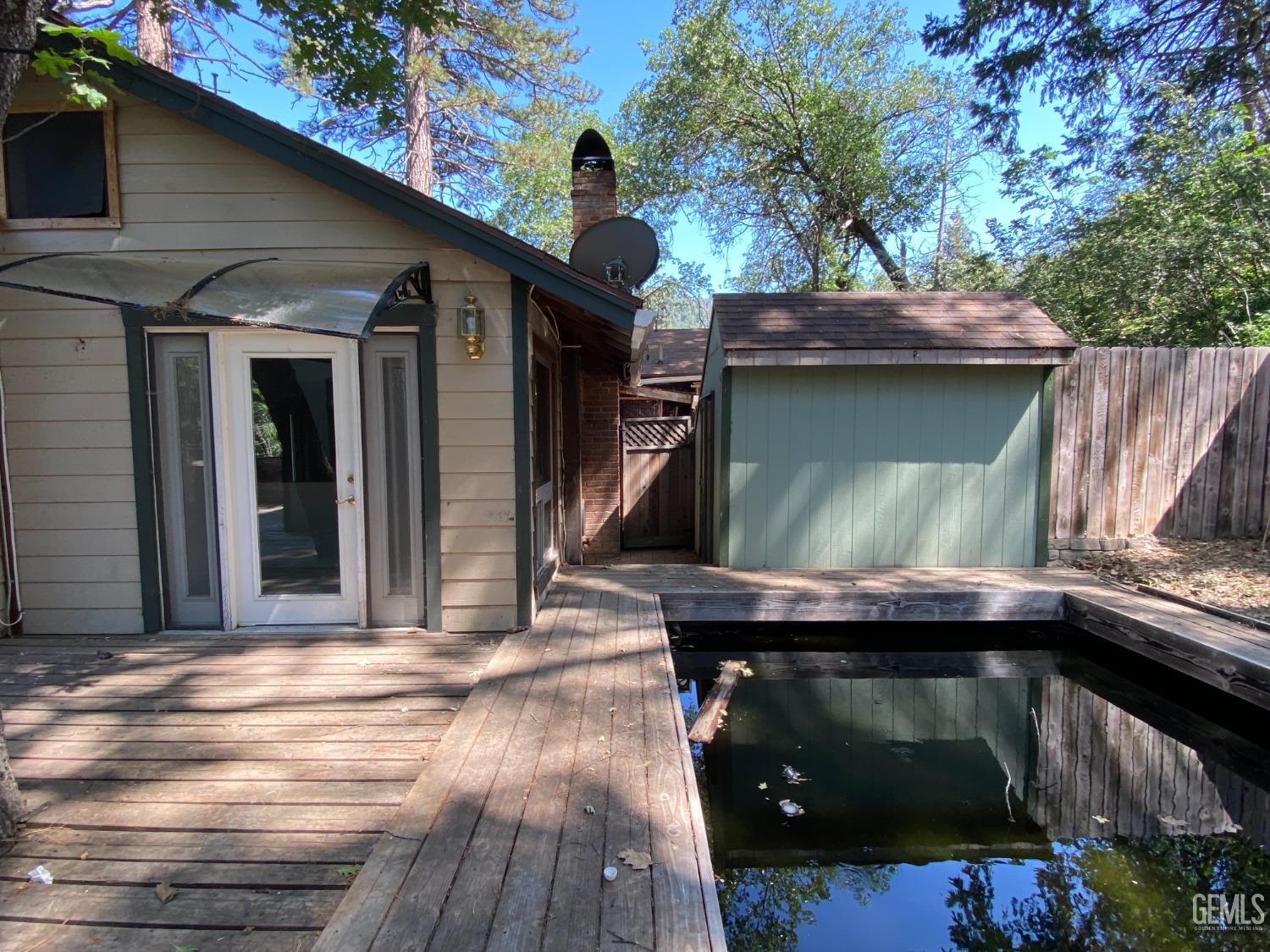 Undisclosed Address Posey, CA 93260 - Photo 18 of 21 a view of a house with a door
