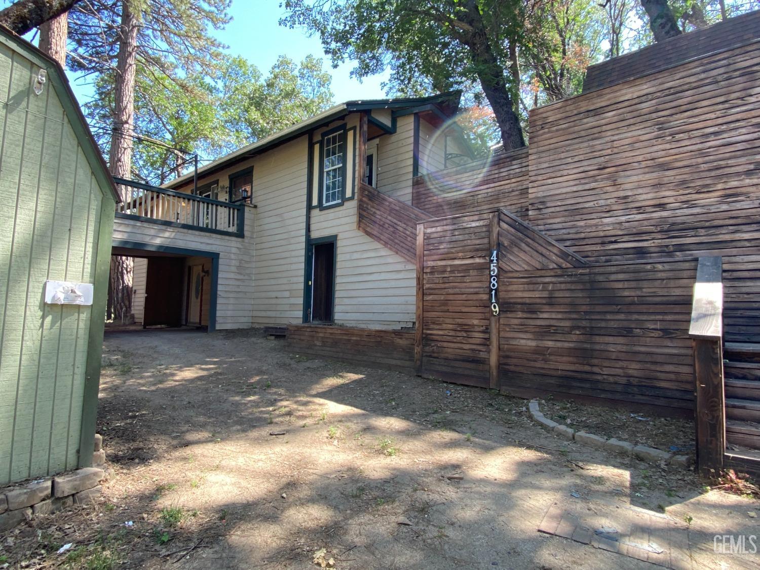 Undisclosed Address Posey, CA 93260 - Photo 2 of 21 a view of a house with a yard