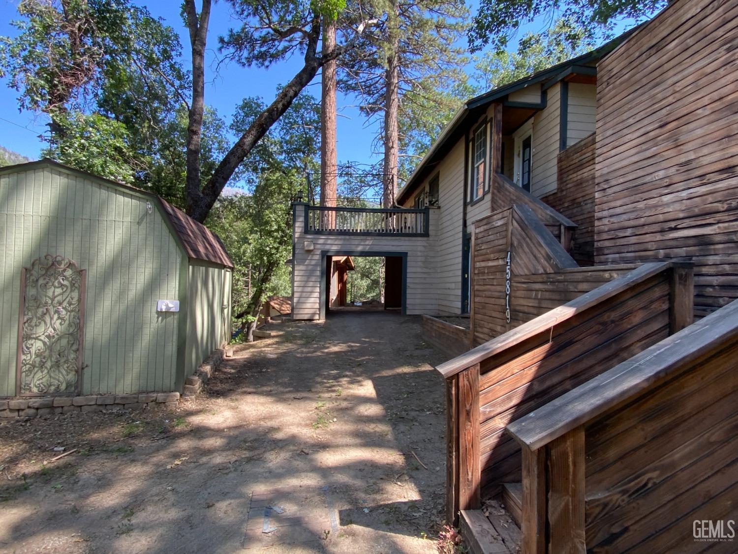 Undisclosed Address Posey, CA 93260 - Photo 3 of 21 a view of a house with a yard