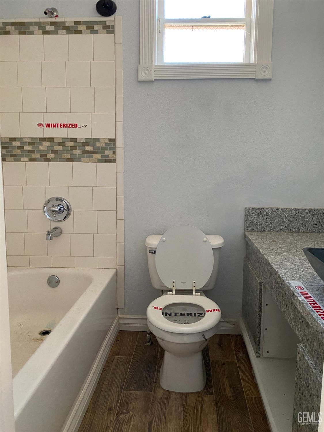 Undisclosed Address Posey, CA 93260 - Photo 5 of 21 a bathroom with a toilet and a bathtub