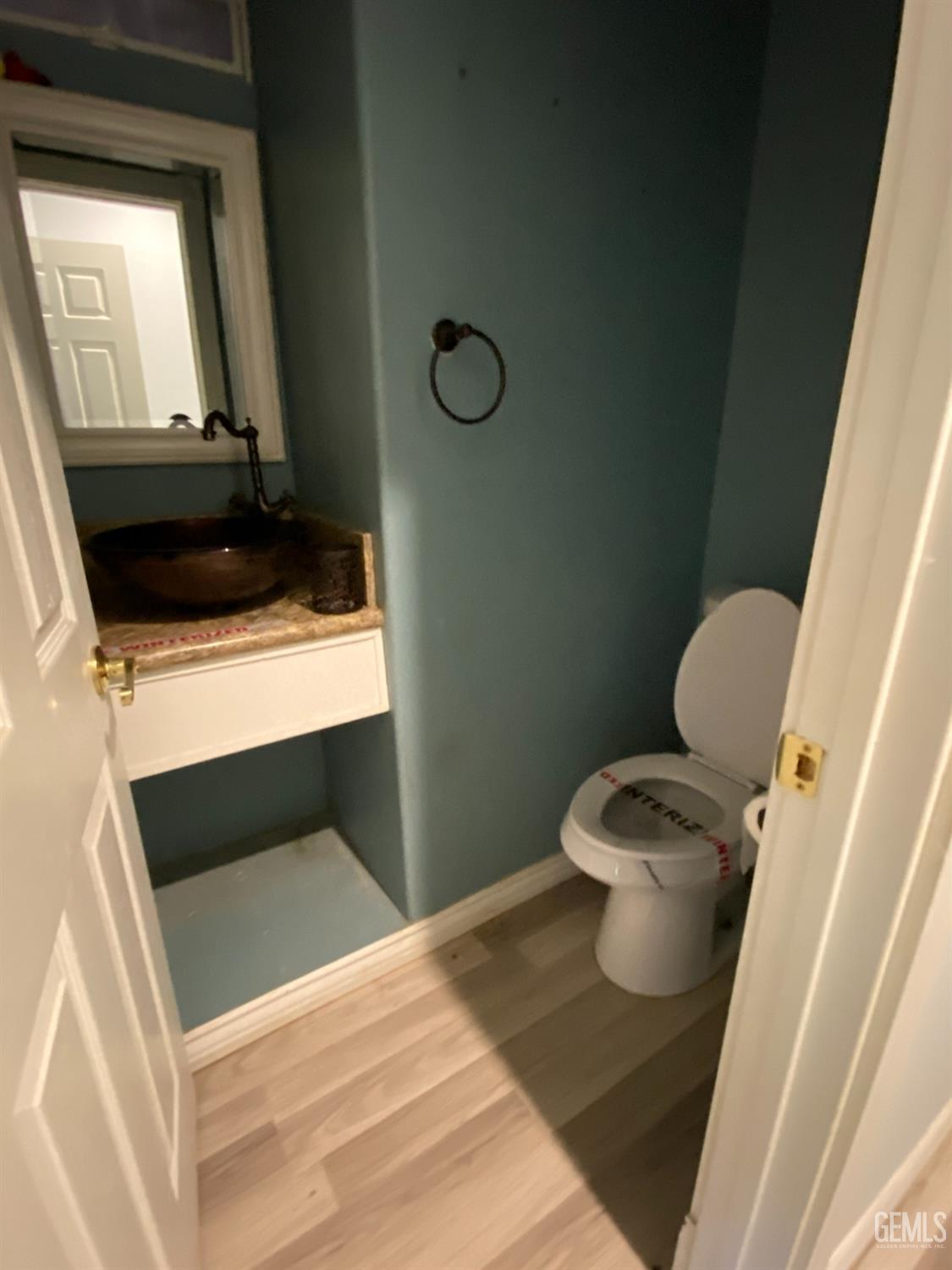 Undisclosed Address Posey, CA 93260 - Photo 10 of 21 a bathroom with a toilet sink and mirror