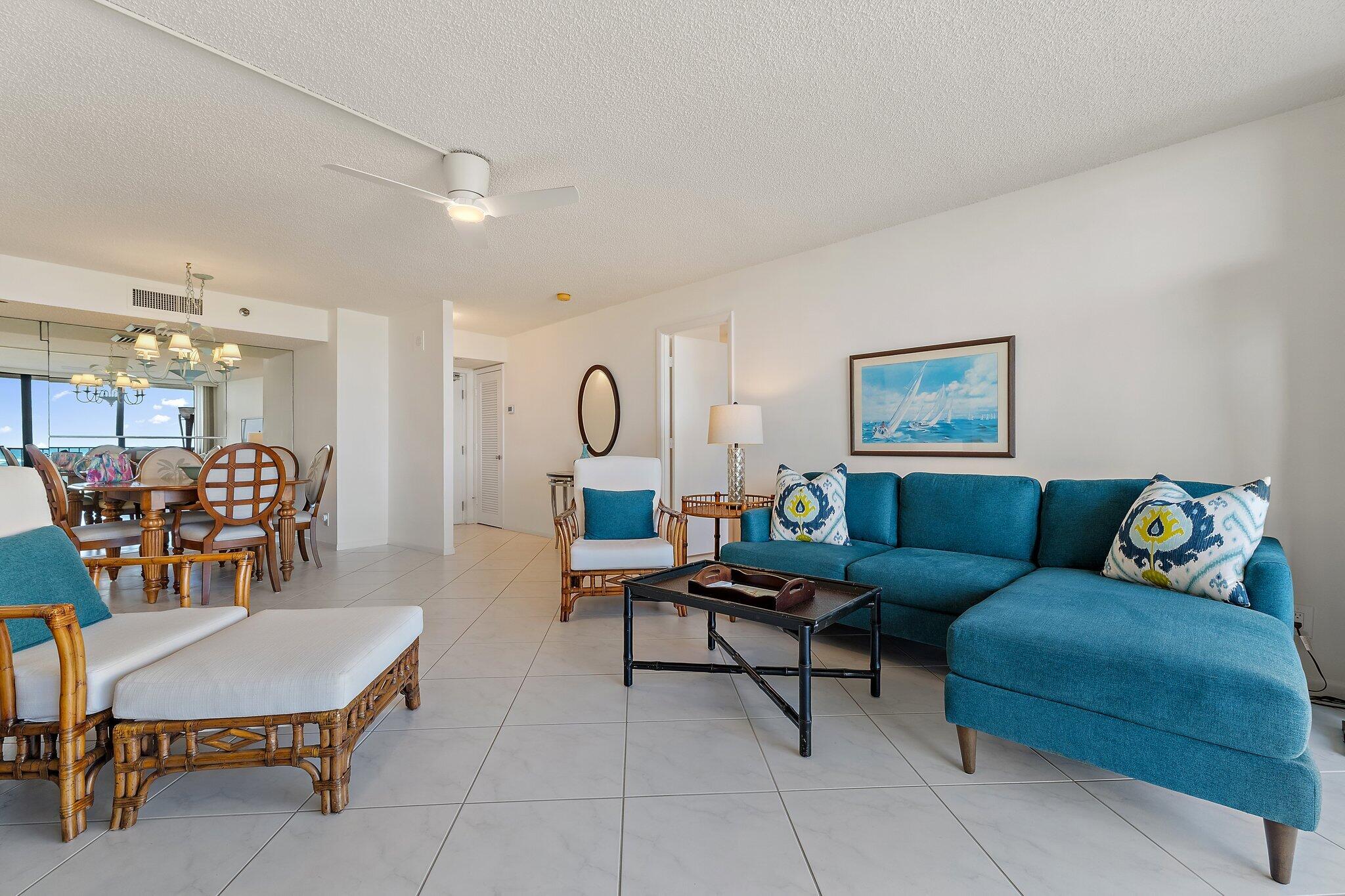 100 Ocean Trail Way, Unit 405 Jupiter, FL 33477 - Photo 10 of 38 a living room with furniture and kitchen view