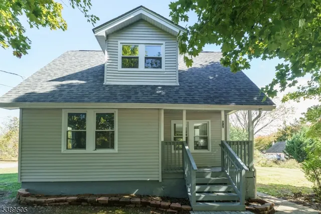 a view of a door and a window