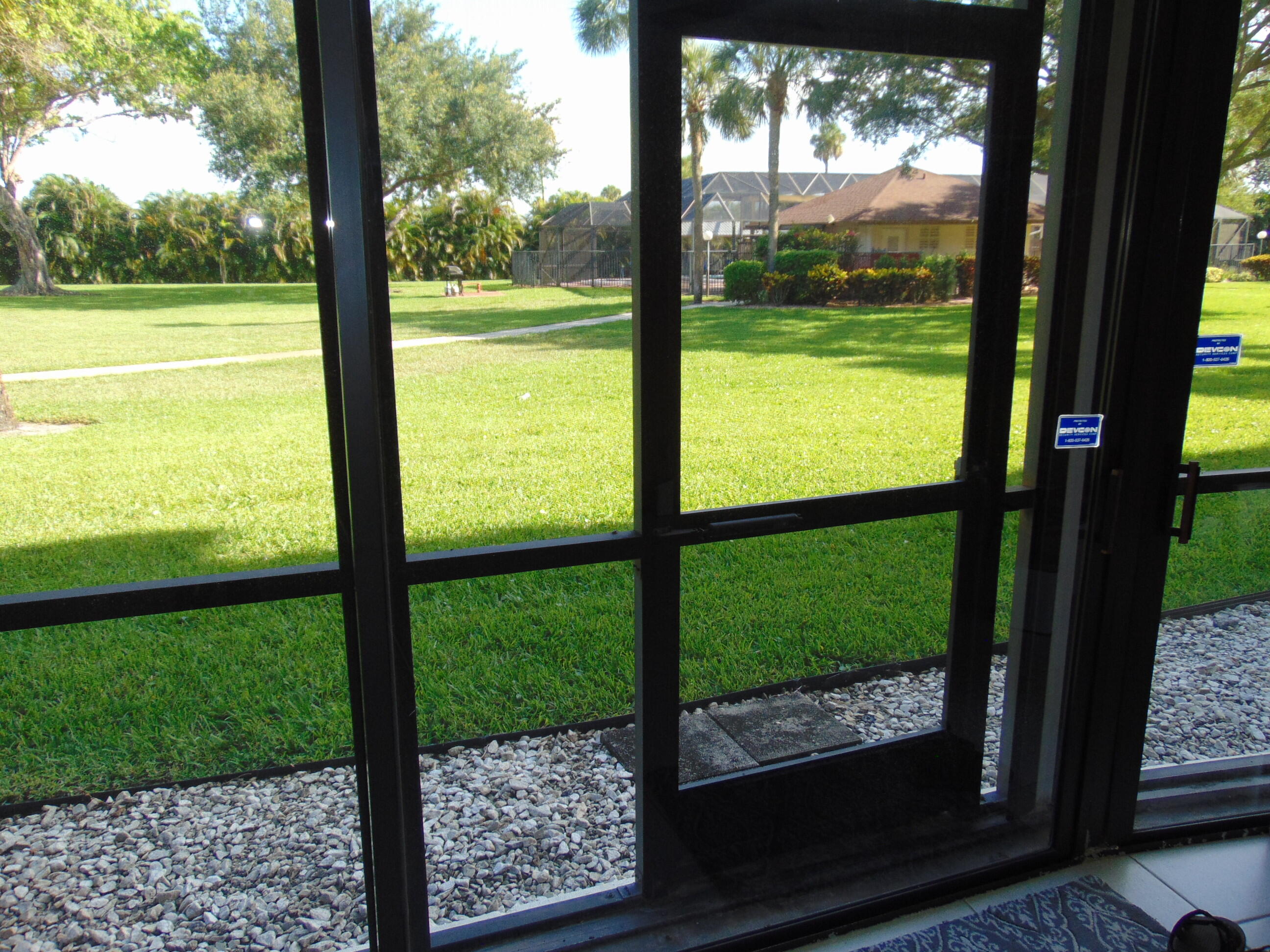 9220 Southwest 14th Street, Unit 3103 Boca Raton, FL 33428 - Photo 37 of 58 a view of a from a window