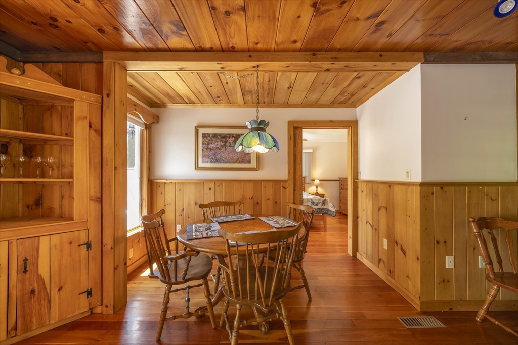 27 Pond Hill Road Goshen, MA 01096 - Photo 11 of 40 a dining room with furniture and wooden floor