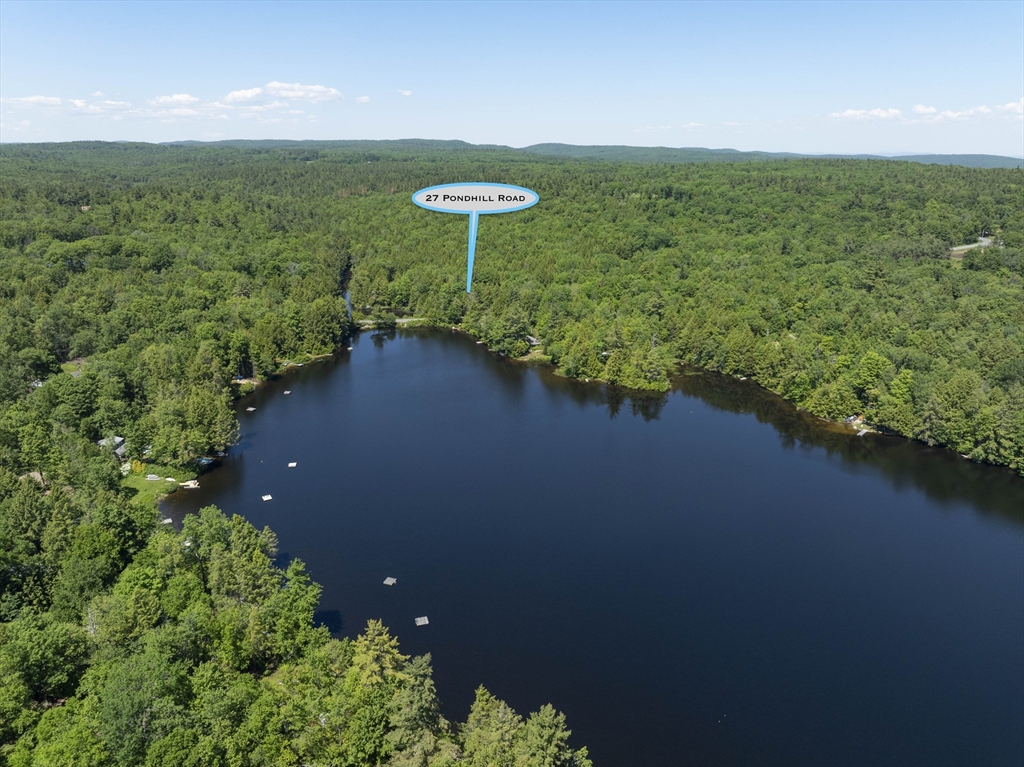 27 Pond Hill Road Goshen, MA 01096 - Photo 38 of 40 a view of a lake with a yard