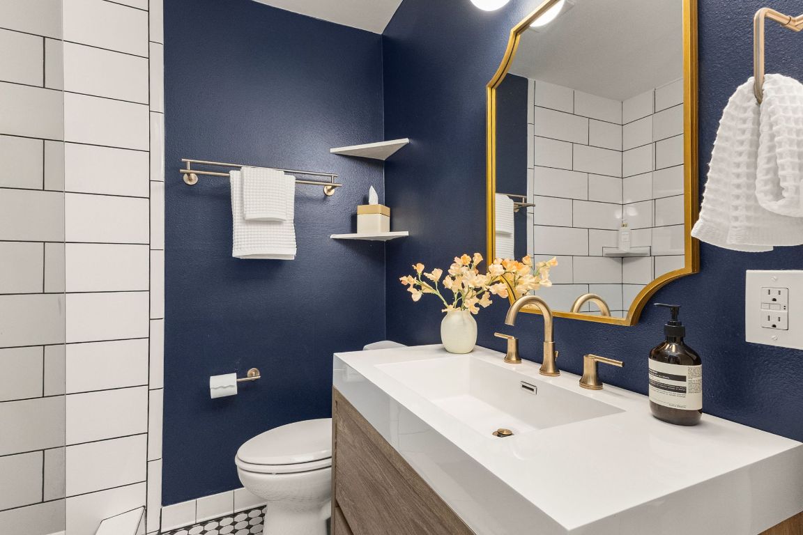 4312 Rosedale Avenue Austin, TX 78756 - Photo 14 of 40 Bathroom featuring vanity and a textured wall