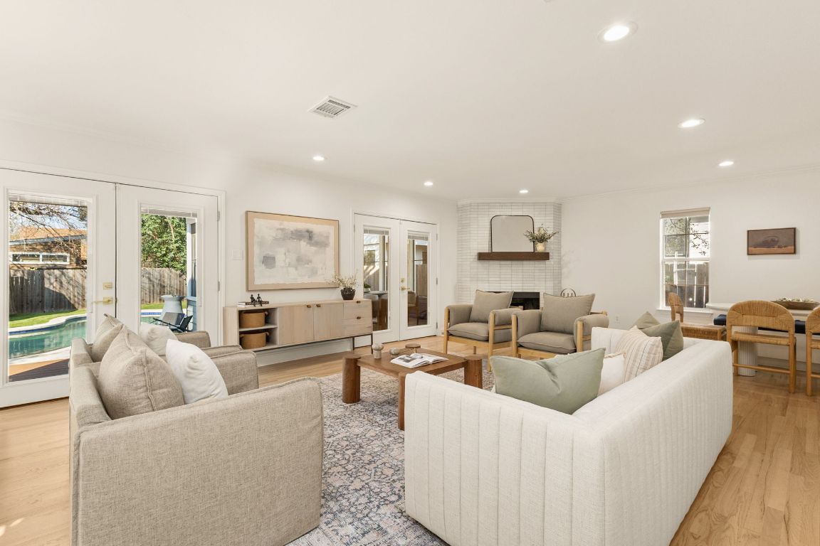 4312 Rosedale Avenue Austin, TX 78756 - Photo 21 of 40 Living area with french doors, light wood finished floors, and recessed lighting