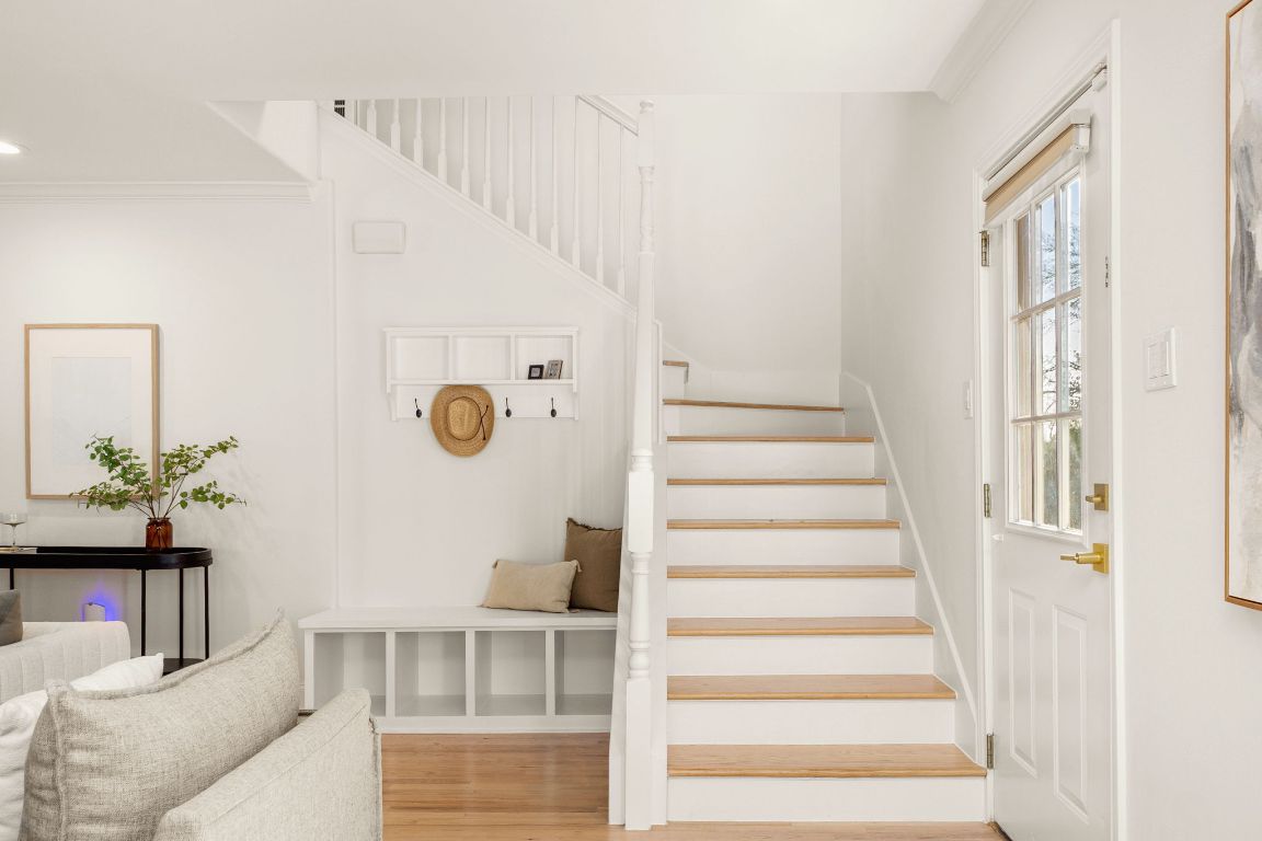4312 Rosedale Avenue Austin, TX 78756 - Photo 23 of 40 Stairs with wood finished floors and crown molding