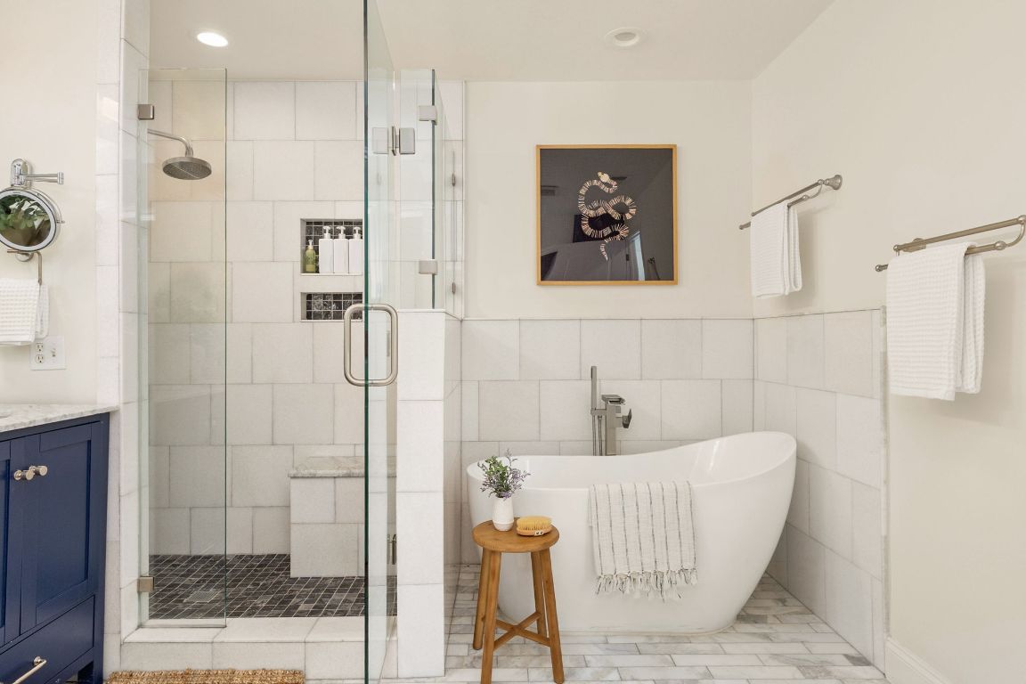4312 Rosedale Avenue Austin, TX 78756 - Photo 26 of 40 Bathroom with a freestanding bath, a shower stall, vanity, and recessed lighting