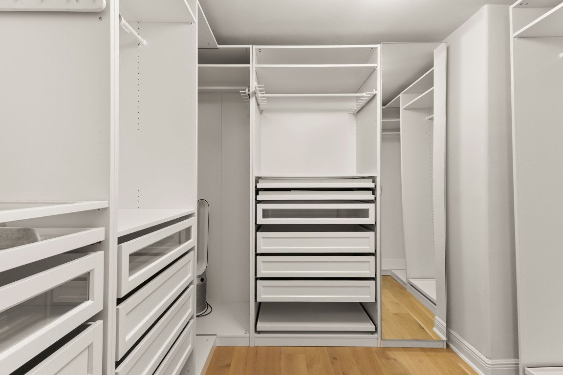 4312 Rosedale Avenue Austin, TX 78756 - Photo 27 of 40 Walk in closet with light wood-style floors