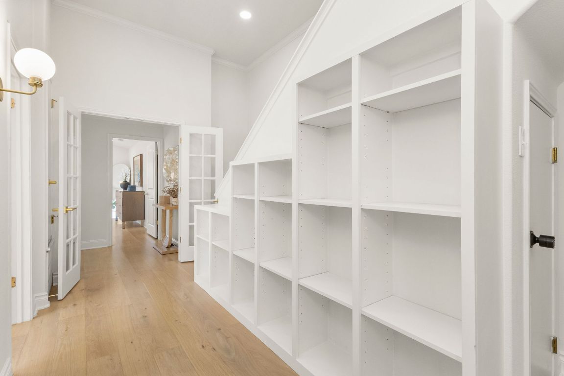 4312 Rosedale Avenue Austin, TX 78756 - Photo 28 of 40 Hall featuring light wood-type flooring and crown molding