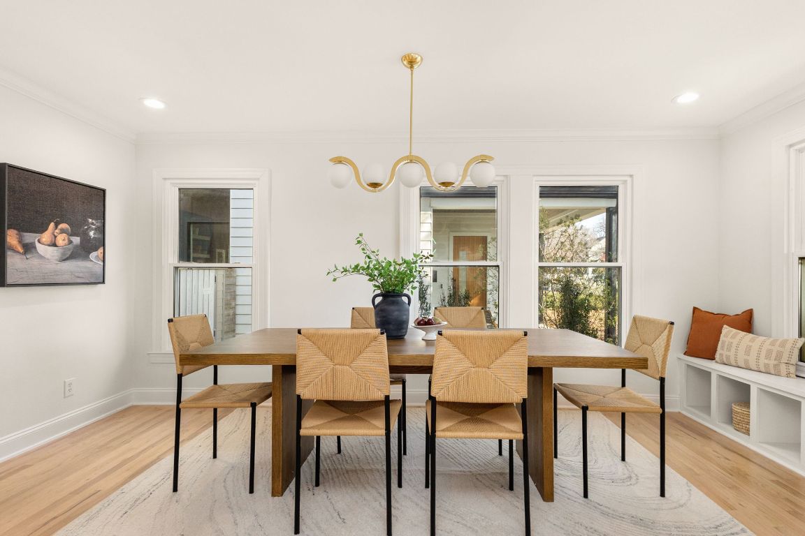 4312 Rosedale Avenue Austin, TX 78756 - Photo 4 of 40 Dining room with light wood-style floors, ornamental molding, and recessed lighting