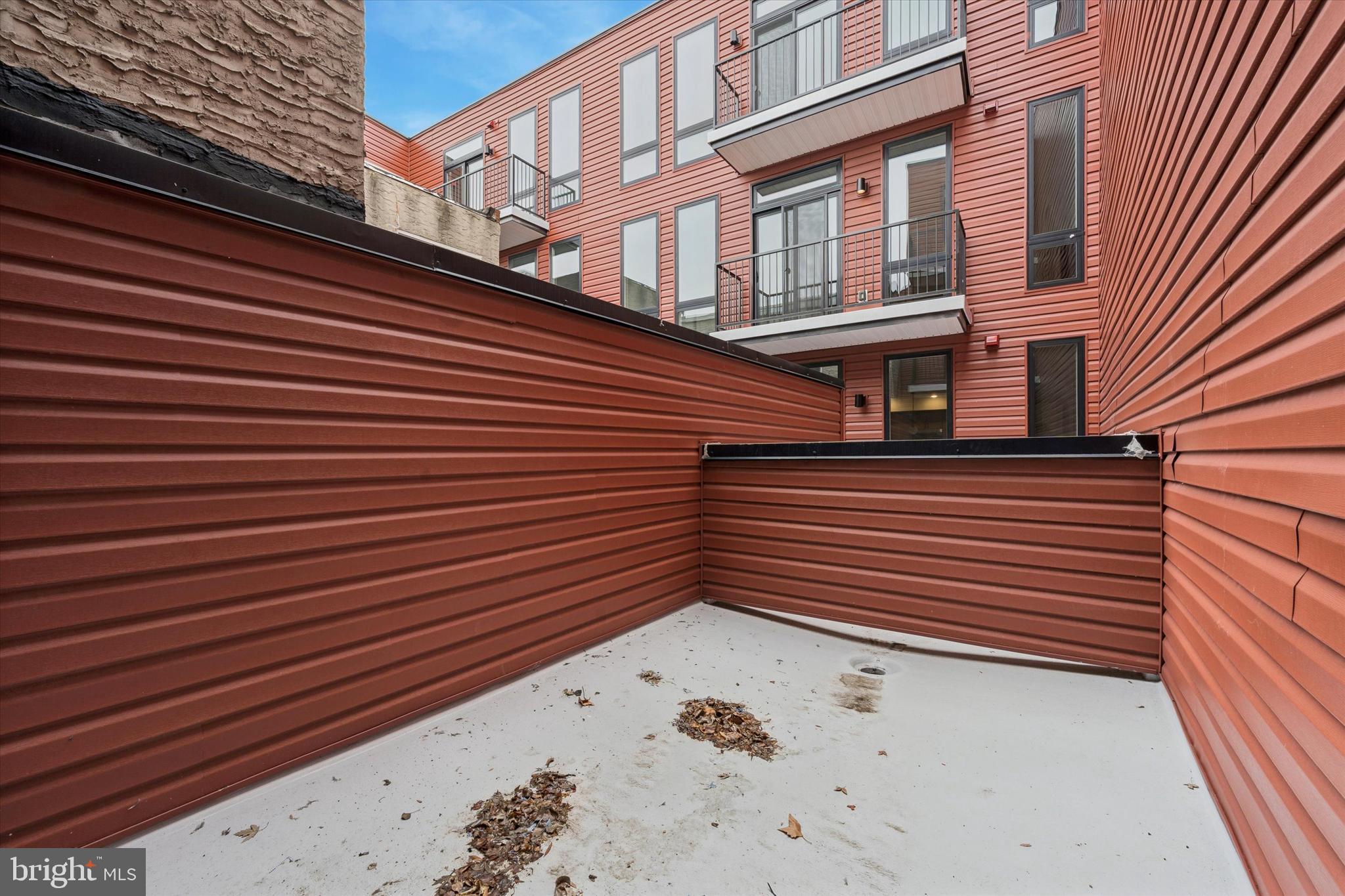754 South 4th Street, Unit 405 Philadelphia, PA 19147 - Photo 12 of 18 a view of a brick building with many windows