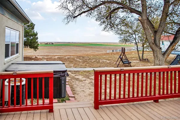 a kitchen with stainless steel appliances granite countertop a sink and a refrigerator