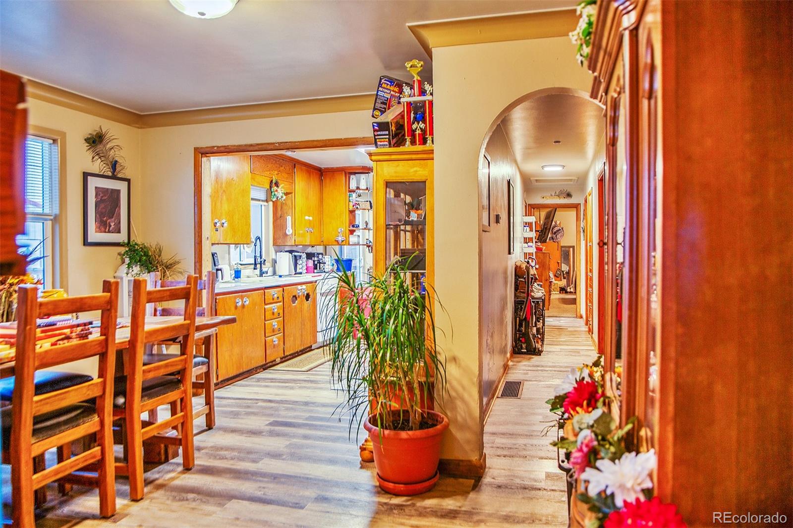 17754 County Road JJ Fort Morgan, CO 80701 - Photo 24 of 33 a vase of flowers sitting next to a window