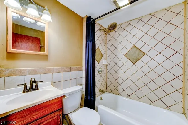 a bathroom with a sink and toilet