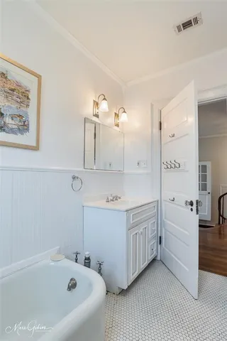 a bathroom with a sink and a bathtub
