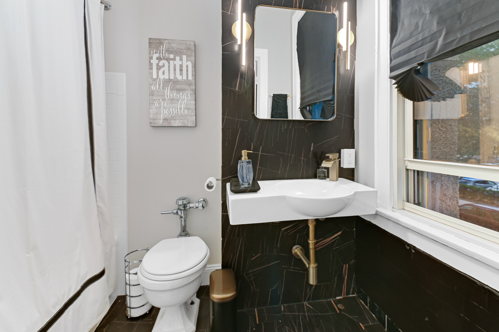 5000 South East End Avenue, Unit 2D Chicago, IL 60615 - Photo 15 of 22 a bathroom with a sink a toilet and mirror
