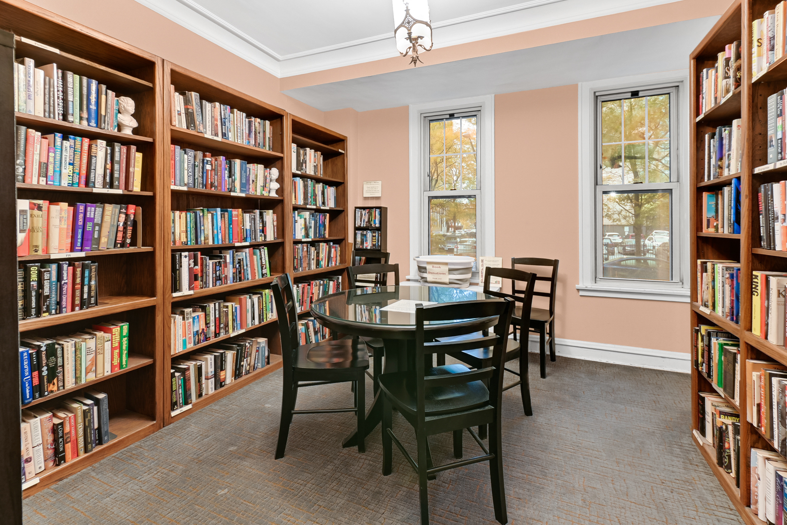 5000 South East End Avenue, Unit 2D Chicago, IL 60615 - Photo 16 of 22 a view of a livingroom with furniture and a bookshelf